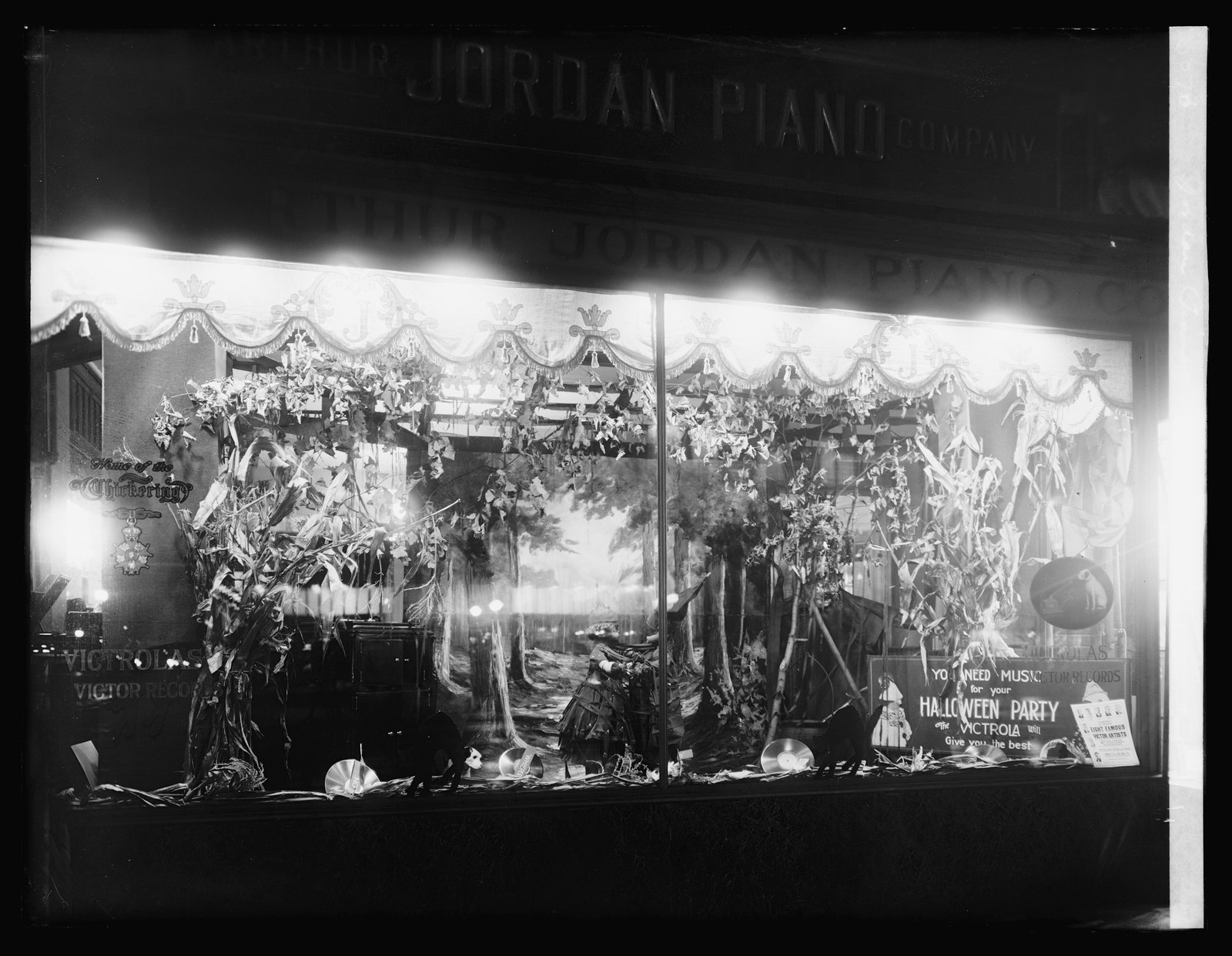 A vintage piano store window with decorations — the visual register of quiet domestic music